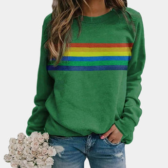 
A women's green rainbow stripe crew neck long-sleeve sweatshirt, shown in a 3XL size, featuring colorful stripes on the fabric.