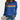 
A women's blue sweatshirt featuring rainbow stripes across the chest, with a crew neck and long sleeves, shown in size 3XL.