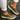 Women's blue suede slip-on shoes featuring a colorful perforated band, white sole, and a touch of green, size 43.