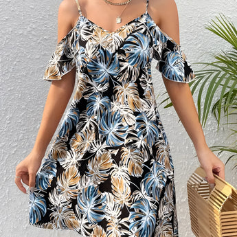 
A woman wearing a blue and white floral cold-shoulder summer dress in size XL, showcasing its elegant design with exposed shoulders and floral patterns.
