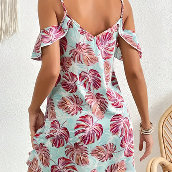 Women's blue and white floral cold-shoulder summer dress displayed on a mannequin, featuring an elegant sheath design with exposed shoulders and a floral pattern.