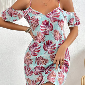 Women's blue and white floral cold-shoulder summer dress with a sheath silhouette, showcasing exposed shoulders and a floral pattern.