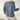 Women's blue and white houndstooth crewneck sweater in retro knitwear style, featuring long sleeves and a classic pattern.