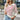 A woman's blue and white striped lightweight pullover sweater featuring long sleeves and a relaxed fit.