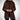 Elegant blue wool coat for women, featuring a tailored design and a sophisticated collar. The coat has long sleeves and a classic overcoat style, suitable for winter wear. The color appears to be a mix of blue with hints of grey, adding a unique touch to the garment. The model is showcasing the coat with a confident gesture, highlighting its elegant fit on the shoulders and arms.