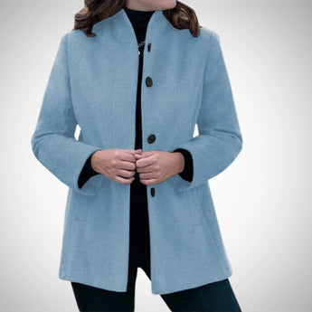 Women's blue wool coat in size 3XL, featuring a tailored fit with elegant design details such as a structured collar, long sleeves, and a refined shoulder cut, perfect for winter wear.