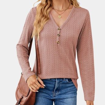 Women's blush pink cable knit turtleneck sweater featuring a cozy fall fashion style, shown in a rose color and size 2XL, highlighting detailed knit texture with a snug collar and long sleeves.