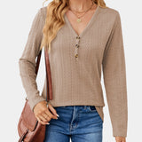 Blush pink cable knit turtleneck sweater for women with long sleeves and a cozy design, ideal for fall fashion.