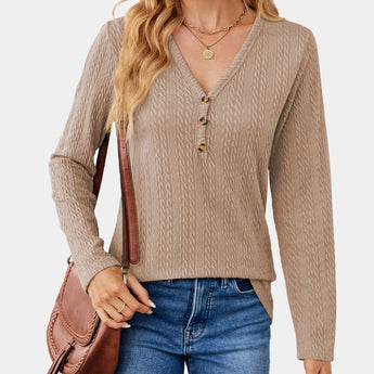 Blush pink cable knit turtleneck sweater for women with long sleeves and a cozy design, ideal for fall fashion.
