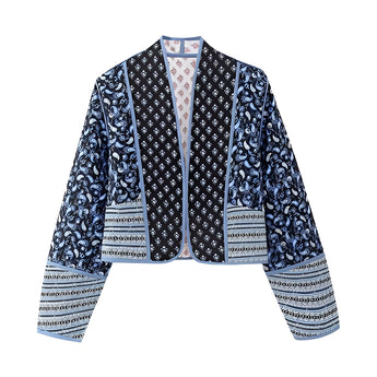 Women's bohemian ethnic print bomber jacket in blue, featuring a lightweight design perfect for spring. The jacket is styled with a classic collar, full sleeves, and intricate ethnic patterns, offering a casual yet chic look.