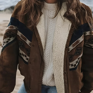Brown women's boho suede jacket with tribal pattern, displayed on a model wearing jeans. The jacket features a stylish coastal outerwear design, suitable for casual fashion.