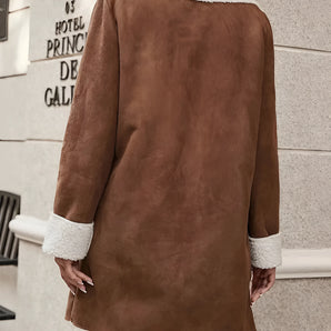 Women's brown shearling-lined suede winter coat, featuring a stylish overcoat design with long sleeves and a fashionable waistline, crafted from high-quality beige textile.