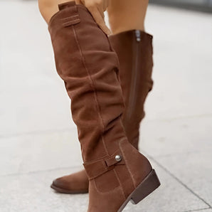 Brown suede slouchy knee-high boots for women in bohemian fall style, showcasing the fashion design with focus on knee and leg area.