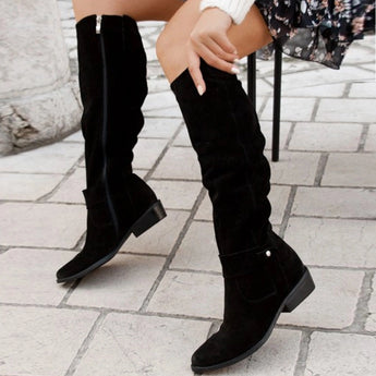 Women's brown suede slouchy knee-high boots with a bohemian fall style, showcasing a soft suede texture and relaxed fit, perfect for stylish comfort in cooler weather.