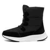 Women's brown waterproof insulated high-top snow boots designed for outdoor activities, showcasing a stylish fashion design with durable synthetic rubber soles.