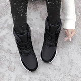 Stylish high-top women's snow boots in brown, featuring a waterproof and insulated design, perfect for winter weather.