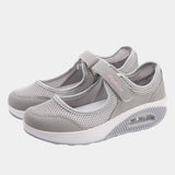 Women's gray mesh Mary Jane sneakers with an air cushion design, featuring a comfortable and supportive fit suitable for walking and outdoor activities.