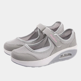 Women's gray mesh Mary Jane sneakers with an air cushion design, featuring a comfortable and supportive fit suitable for walking and outdoor activities.