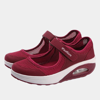 Women's burgundy mesh Mary Jane sneakers with comfortable air cushion, featuring a sleek design suitable for walking and outdoor activities.