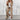 Women's business casual blazer and trousers set in cachi color, size XL, featuring a structured shoulder design, long sleeves, and a tailored fit through the waist and thighs.