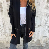 Black women's coat in lightweight wool, featuring a casual chic design with a structured collar and long sleeves, suitable for fall outerwear.