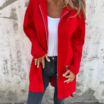 Women's camel coat made of lightweight wool, featuring a casual chic design for fall. The coat has a tailored fit with a collar, long sleeves, and a defined waist.