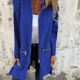 A plus-size women's blue camel coat made from lightweight wool, designed for fall wear, featuring a casual chic style with a collar and long sleeves.