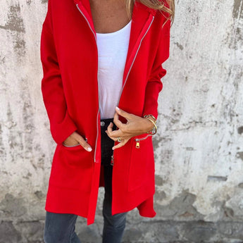 Red oversized women's coat made of lightweight wool, featuring a casual chic design with a collar and long sleeves, styled for fall wear.