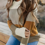 Women's color-blocked cozy knit sweater featuring a trendy tri-color design with grey, showcasing long sleeves and a comfortable loose fit.