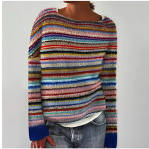 Colorful striped knit sweater for women with a stylish boat neck design, featuring shades of magenta and electric blue, long sleeves, and a modern fashion accessory appeal.