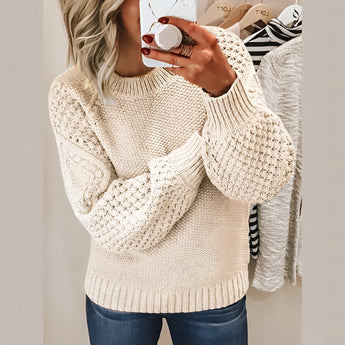 
A women's beige cable knit sweater in size 3XL with a cozy winter fashion design, featuring long sleeves and a comfortable fit around the shoulders and waist.