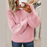 Women's cozy pink cable knit sweater in 3XL, featuring a winter fashion pullover design with long sleeves and a textured knit pattern.