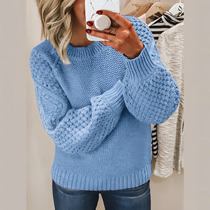 
A cozy blue cable knit sweater for women in size 3XL, featuring a winter fashion pullover design with long sleeves and a textured knit pattern.
