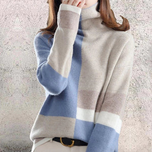A cozy blue and white striped turtleneck sweater designed for women, perfect for winter wear, with a focus on the neck and shoulder area.