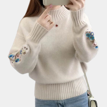 Women's cozy floral embroidered sweater in khaki, size XL, featuring intricate detailing on the shoulder and arm areas, perfect for autumn and winter fashion.
