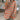 
A women's cozy loose knit sweater in orange and gray stripes, featuring a relaxed fit with long sleeves and a soft neckline, suitable for fall fashion in a 4XL size.