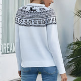 Women's white winter sweater featuring a reindeer and snowflake knit design, with long sleeves and a cozy fit.