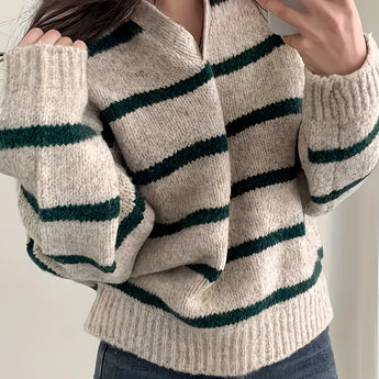 Women's cream and burgundy striped puff sleeve sweater, showcasing the shoulder and sleeve design, ideal for autumn wear.