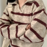 Cream and burgundy striped puff sleeve sweater for women in chestnut brown, featuring a cozy knit design, round neckline, and long sleeves, ideal for autumn wear.