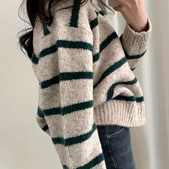 Women's cream and burgundy striped puff sleeve sweater, featuring a comfortable knit design perfect for autumn, showcased on a model.