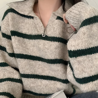 Women's cream and burgundy striped puff sleeve sweater with a round neck, featuring a stylish and cozy design perfect for autumn.