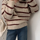 Women's cream and burgundy striped puff sleeve sweater, featuring an autumn knitwear design.