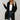 
A stylish women's black mid-length teddy coat in XL size, featuring cozy plush material and a fashionable design with a prominent collar and full-length sleeves.