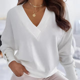 Women's white XXL deep V-neck sweater featuring button cuffs, long sleeves, and a relaxed fit, suitable for office wear or casual outings.