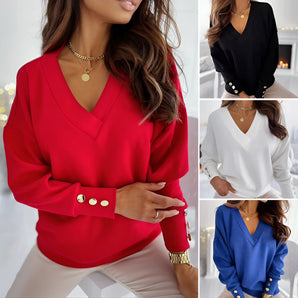 Women's deep V-neck sweater with button cuffs, featuring a cozy knit design suitable for office and casual settings, displayed on a model showcasing the shoulder and sleeve details. The sweater is primarily in black and white colors.