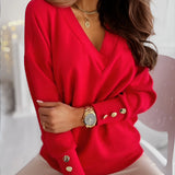 Women's pink sweater with a deep V-neck and button cuffs, suitable for office and casual wear, featuring long sleeves and a comfy knit design.