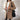 Women's khaki double-breasted long winter coat in 5XL, showcasing chic urban style with a tailored fit, featuring lapel collar, button detailing, and long sleeves.