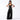 
A woman wearing an elegant black formal wide-leg sleeveless jumpsuit in size 2XL.
