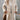 
Image shows a women's oversized winter coat in cream wool, styled for fall fashion. The coat features a classic design with a focus on elegance and comfort. It has long sleeves and a sophisticated neckline, often paired with a dress shirt for a chic look. The variant displayed is in the color pink, size 2XL, showcasing its fashionable appeal as outerwear for women.