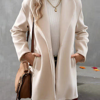 
Image shows a women's oversized winter coat in cream wool, styled for fall fashion. The coat features a classic design with a focus on elegance and comfort. It has long sleeves and a sophisticated neckline, often paired with a dress shirt for a chic look. The variant displayed is in the color pink, size 2XL, showcasing its fashionable appeal as outerwear for women.